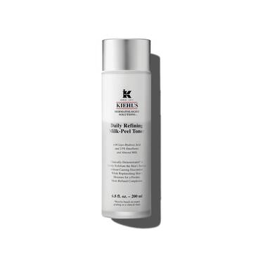 A graphic featuring a frosted bottle of Kiehl's Daily Refining Milk-Peel Toner with a silver cap and a label with black text.