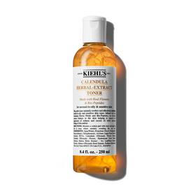 Una botella de 250 ml de Calendula Herbal-Extract Toner de Kiehl's con un liquido transparente y tono dorado.