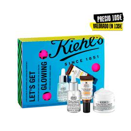 Let's Get Glowing Gift Set in limited-edition packaging with included formulas visible