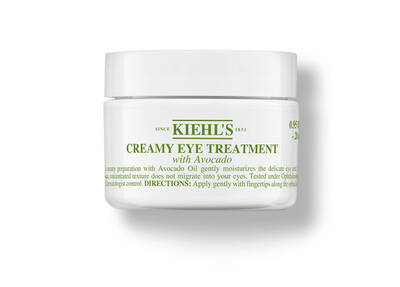 White jar of Kiehl's Creamy Eye Treatment with Avocado, featuring green text and a lid, designed for moisturizing under-eye skin.