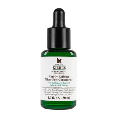 Frasco de concentrado micro-peeling nocturno de Kiehl's, con gotero y etiqueta que destaca sus ingredientes naturales.