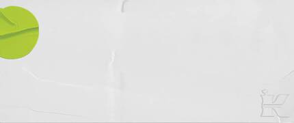 A minimalist design featuring a green circular shape on a white background, with a textured surface and a faint logo or inscription on the right side.