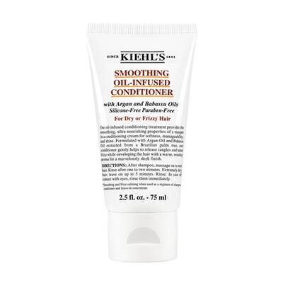 Acondicionador sin silicona de Kiehl's en tubo, disenado para suavizar el cabello seco y encrespado con aceites de argan y baobab.