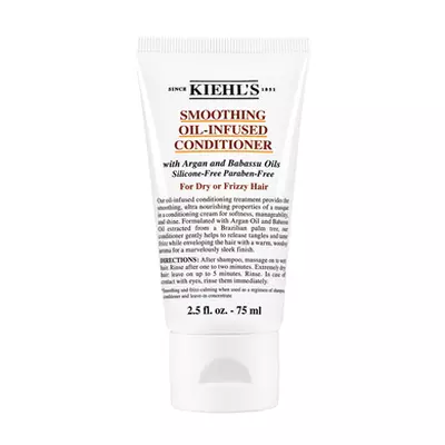 Acondicionador sin silicona de Kiehl's en tubo, disenado para suavizar el cabello seco y encrespado con aceites de argan y baobab.