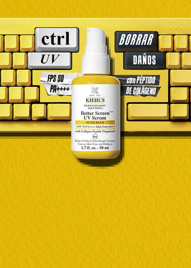 Frasco de Kiehl's Better Screen UV Serum SPF 50 sobre un teclado amarillo creativo con los mensajes 'ctrl UV' y 'Borrar Danos con peptido de colageno'