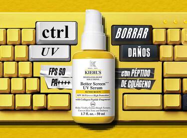 Frasco de Kiehl's Better Screen UV Serum SPF 50 sobre un teclado amarillo creativo con los mensajes 'ctrl UV' y 'Borrar Danos con peptido de colageno'