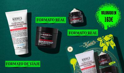 A graphic set against a dark green textured background with bright green accents features three Kiehl’s products and a gift box. On the left is a white tube of "KIEHL’S ULTRA FACIAL BARRIER-HYDRATING CLEANSER" labeled "TRAVEL SIZE." In the center are a black jar of "KIEHL’S AGE DEFENDER CREAM MOISTURIZER" and a black jar of "KIEHL’S AGE DEFENDER EYE REPAIR" with visible cream, both labeled "FULL SIZE." To the right is a boxed Kiehl’s gift set displaying the same three products, decorated with bright green graphic shapes and a bow design."