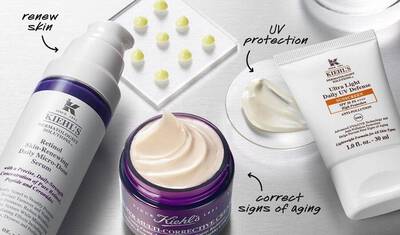 Productos de Kiehl's: suero renovador, crema multi-correctora y protector solar, enfocados en rejuvenecer y proteger la piel.