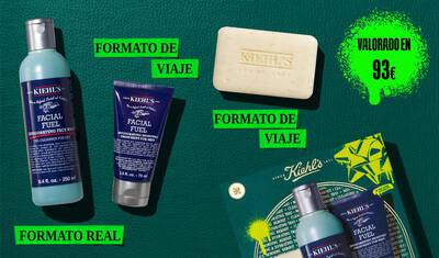 A graphic, set against a dark green textured background, features three Kiehl’s products. A blue bottle of "KIEHL’S FACIAL FUEL INVIGORATING FACE WASH" is labeled "FULL SIZE" in bright green. A dark blue tube of "KIEHL’S FACIAL FUEL MOISTURIZER" is labeled "TRAVEL SIZE" in bright green. A bar of "KIEHL’S 'ULTIMATE MAN' BODY SCRUB SOAP" is also labeled "TRAVEL SIZE" in bright green. In the lower right, a partially visible green Kiehl’s gift box showcases the same three products.