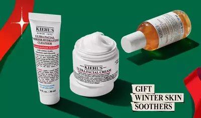 Un set regalo navideno "Winter Skin Soothers" de Kiehl's con Ultra Facial Cream, Ultra Facial Barrier-Hydrating Cleanser y Calendula Herbal-Extract Toner, acompanado de un precio